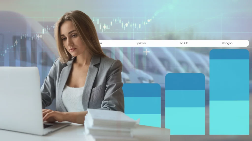 A girl is working in front of a computer and calculates the tco of the fleet